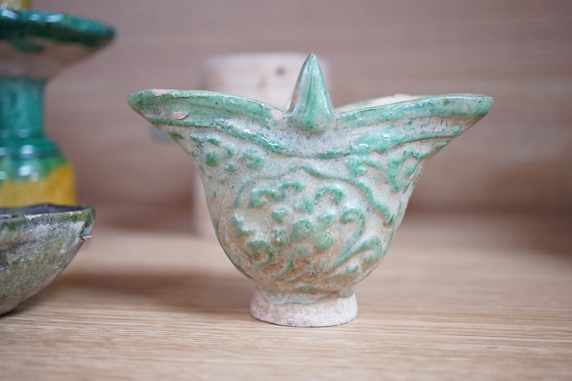 Four Tang dynasty and later pottery items, to include an ear cup, largest 15cm high. Condition - fair